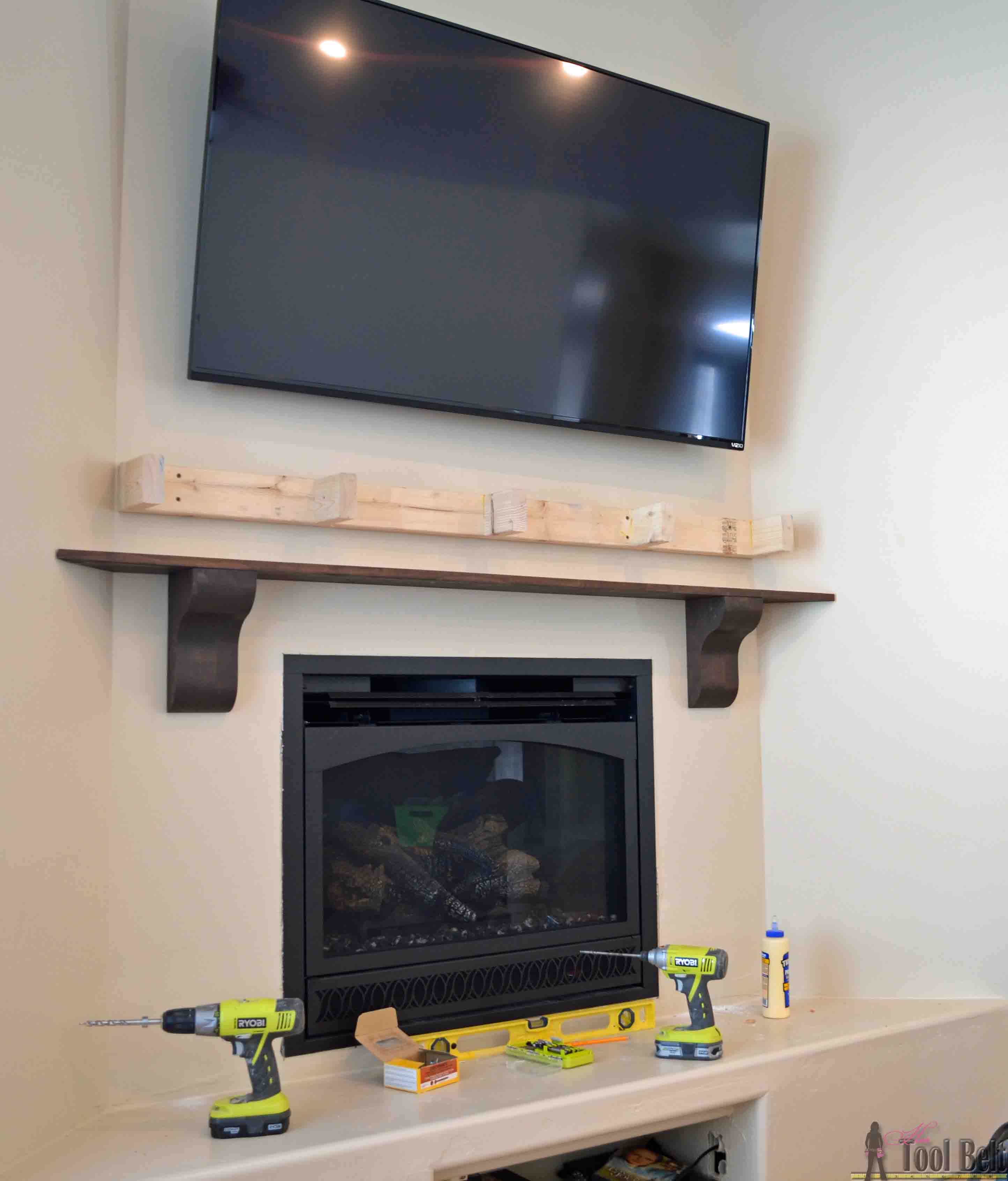 Build a stunning DIY fireplace mantel with readily available wood products.  Free plan and tutorial. 