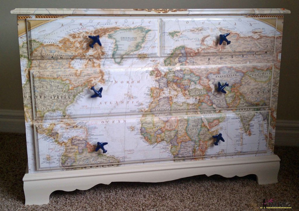 Make over an old dresser into a unique travel theme map dresser with a map and mod podge!