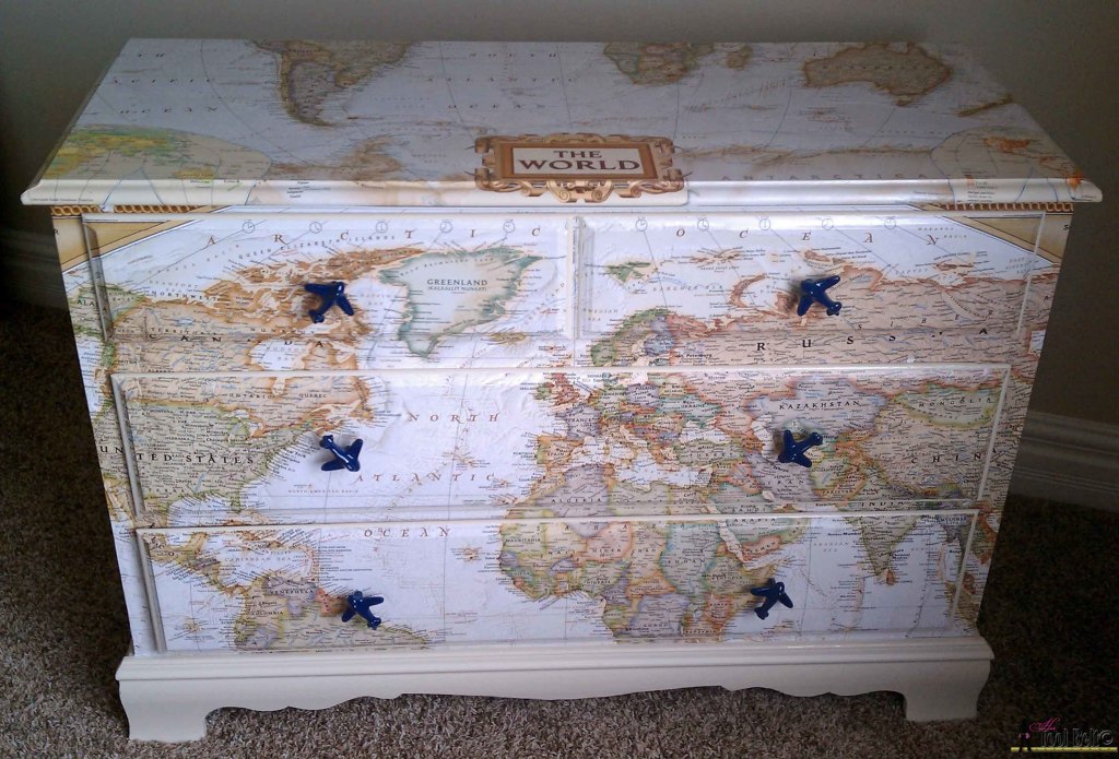 Make over an old dresser into a unique travel theme map dresser with a map and mod podge!