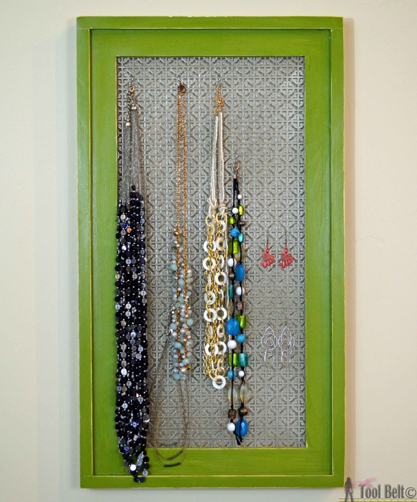 Build a simple stacked wood frame to make a cool jewelry display frame.