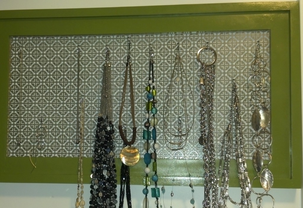 Build a simple stacked wood frame to make a cool jewelry display frame.