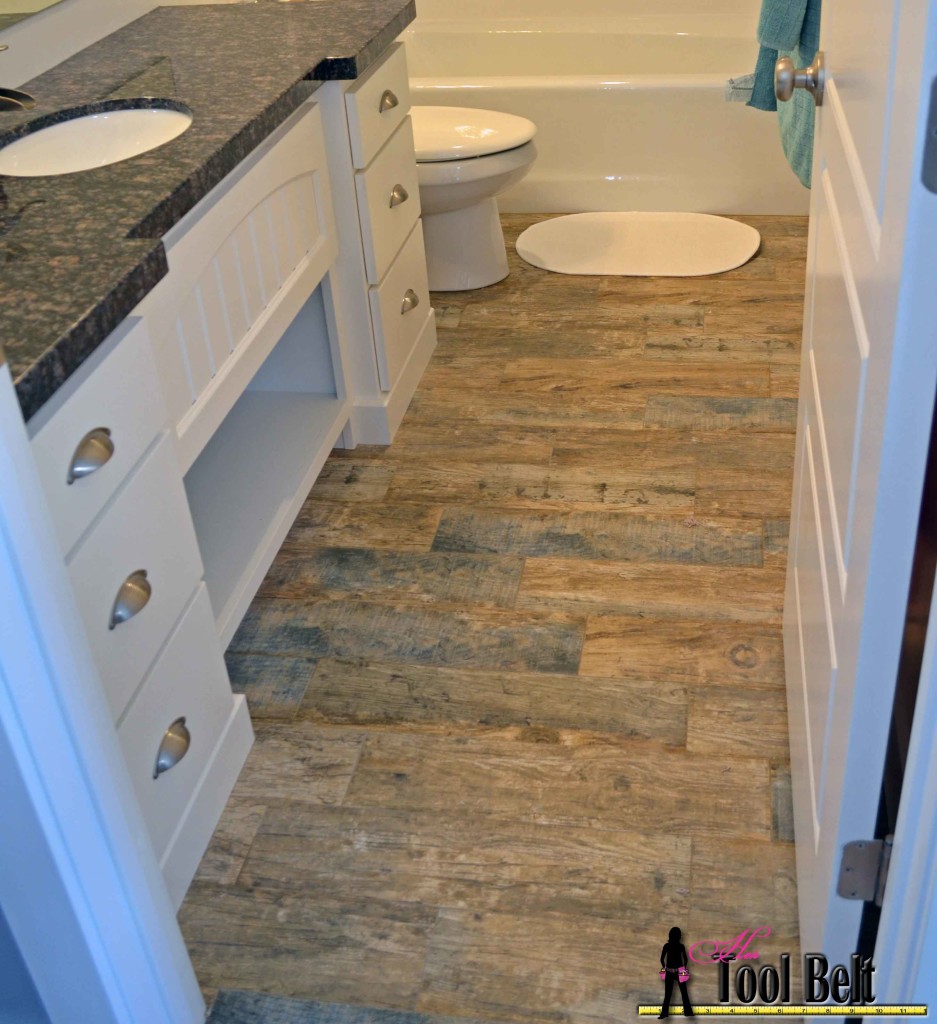 Step by step tutorial showing how to install faux barn wood tiles. This tile looks so good in person and I love the tight grout lines - less cleaning!