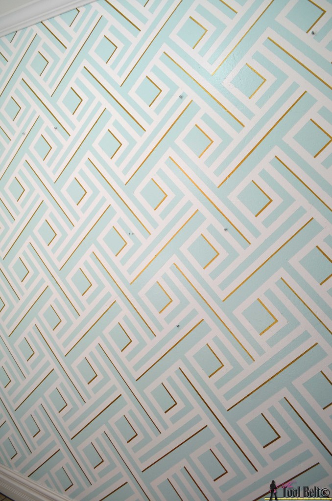 Painting a geometric wall tutorial on hertoolbelt.com  Made with painters tape!