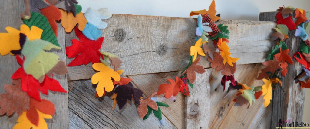 Super easy fall garland from recycled sweaters and felt. #falldecorations #fallcrafts #hertoolbelt