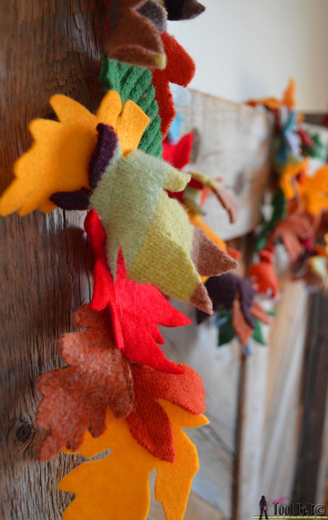 Super easy fall garland from recycled sweaters and felt. #falldecorations #fallcrafts #hertoolbelt