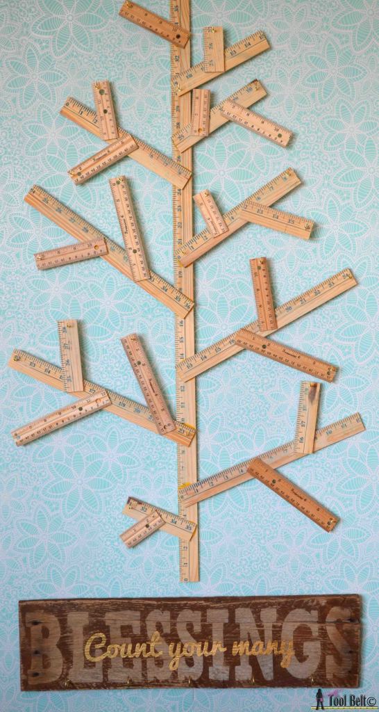 Create an easy Thankful Tree to celebrate the Thanksgiving Holiday. Adorn it with a rustic Count your many Blessing Sign. #GiveThanks