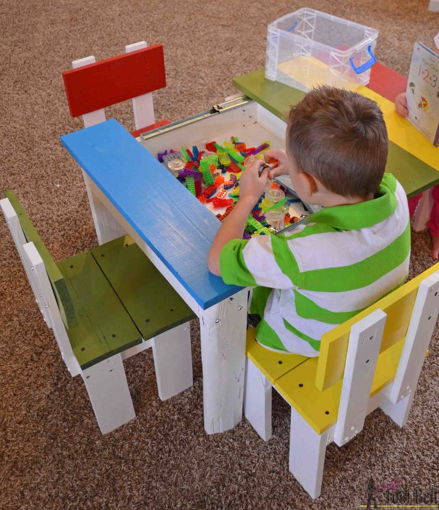 Build an easy kids table and chair set with a sliding top to store Legos. Free plans!