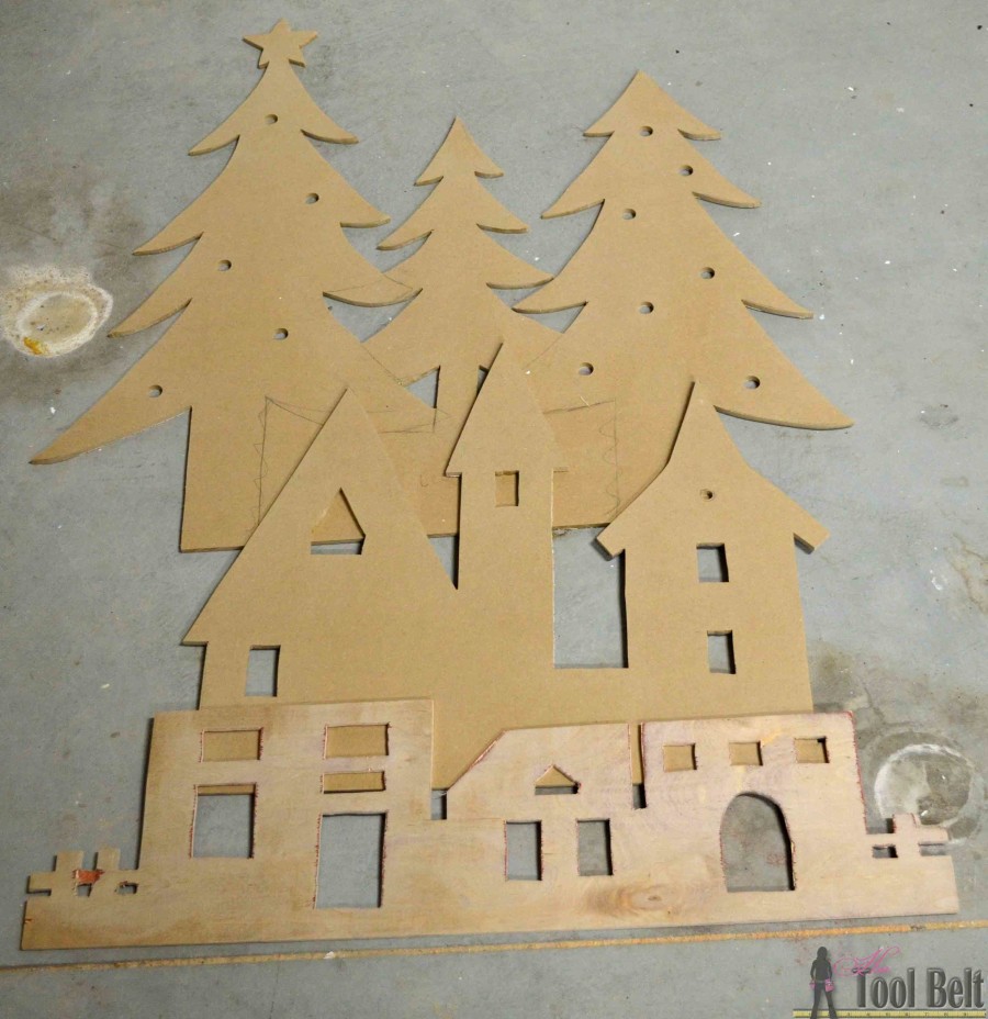DIY Pottery Barn Kid's inspired Christmas village silhouette. 