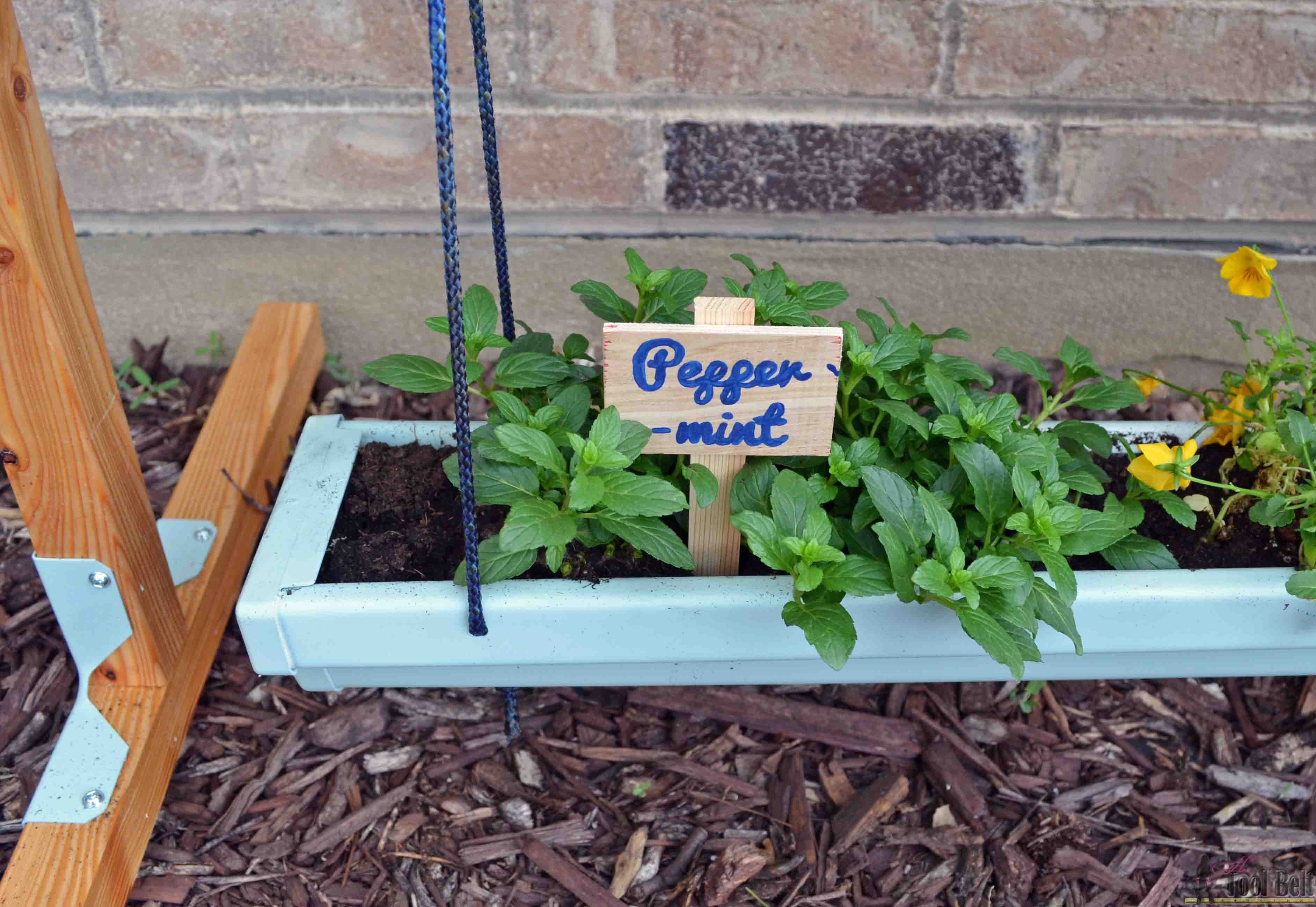 Hanging gutter planter peppermint marker Her Tool Belt