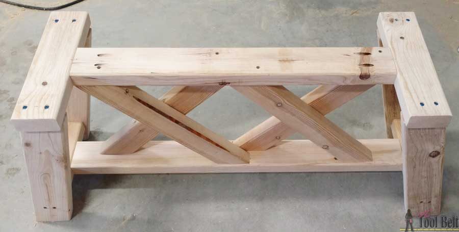 Build a cute little DIY bench for you porch or entry. Use 2x4's to build it for only about $13!!! Free plans