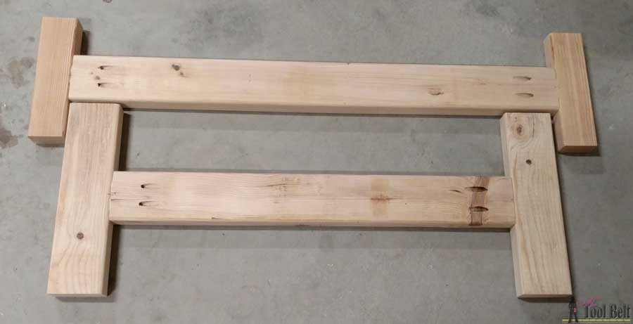 Build a cute little DIY bench for you porch or entry. Use 2x4's to build it for only about $13!!! Free plans
