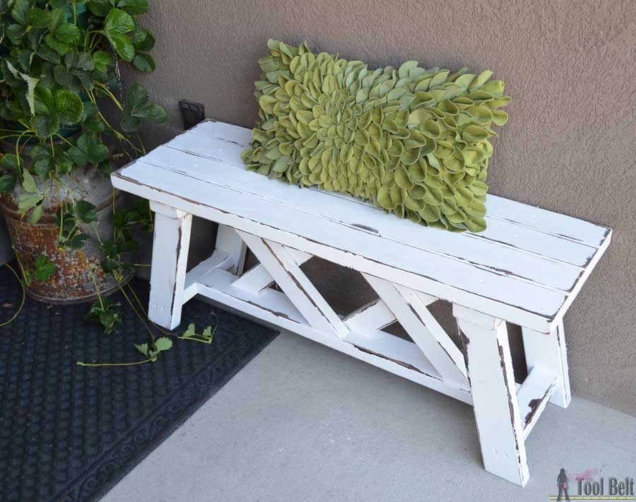 Build a cute little DIY bench for you porch or entry. Use 2x4's to build it for only about $13!!! Free plans