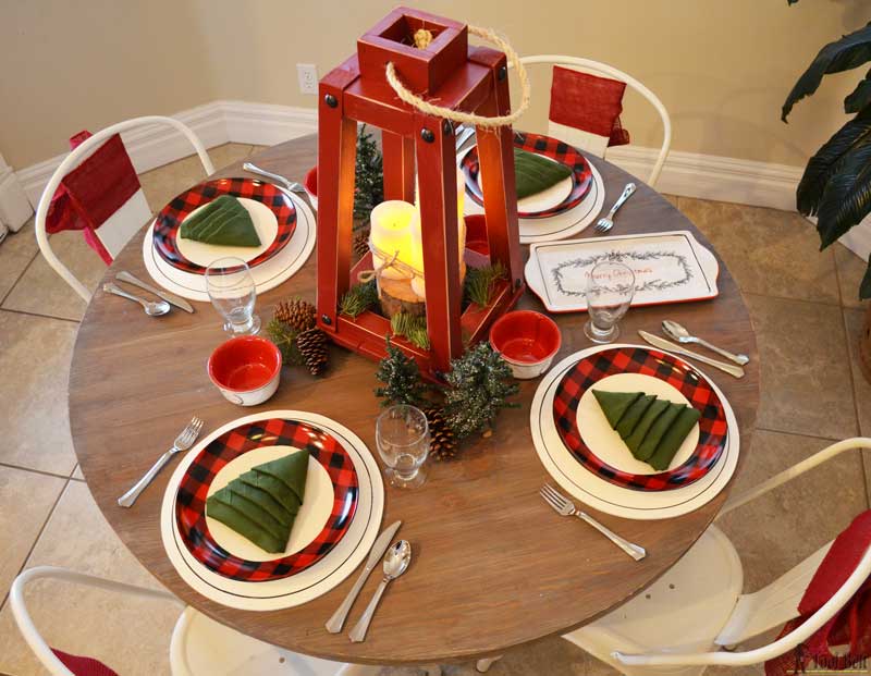 Simple red & black buffalo check and pine tree Christmas table decor. Plus a holiday tablescape tour for lots of fun and festive table ideas.