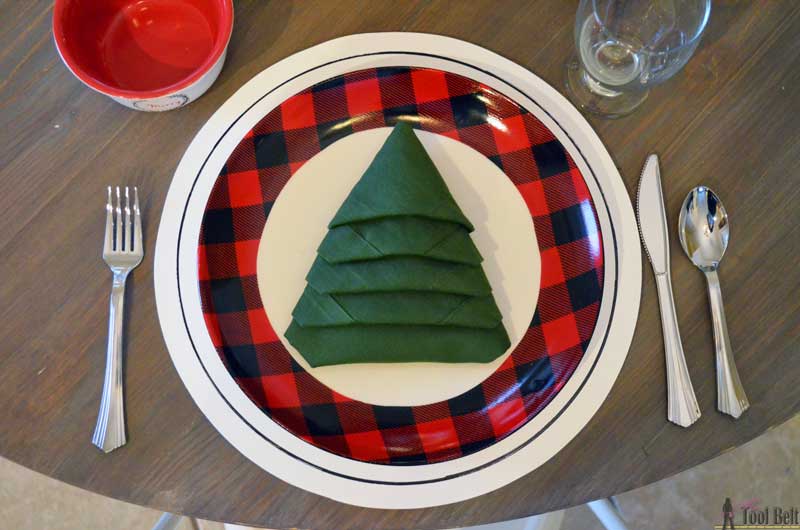 Simple red & black buffalo check and pine tree Christmas table decor. Plus a holiday tablescape tour for lots of fun and festive table ideas.
