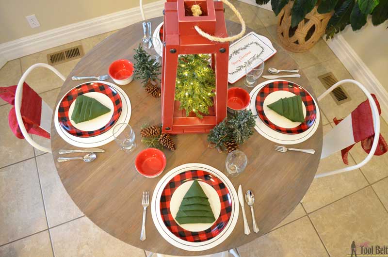 Simple red & black buffalo check and pine tree Christmas table decor. Plus a holiday tablescape tour for lots of fun and festive table ideas.
