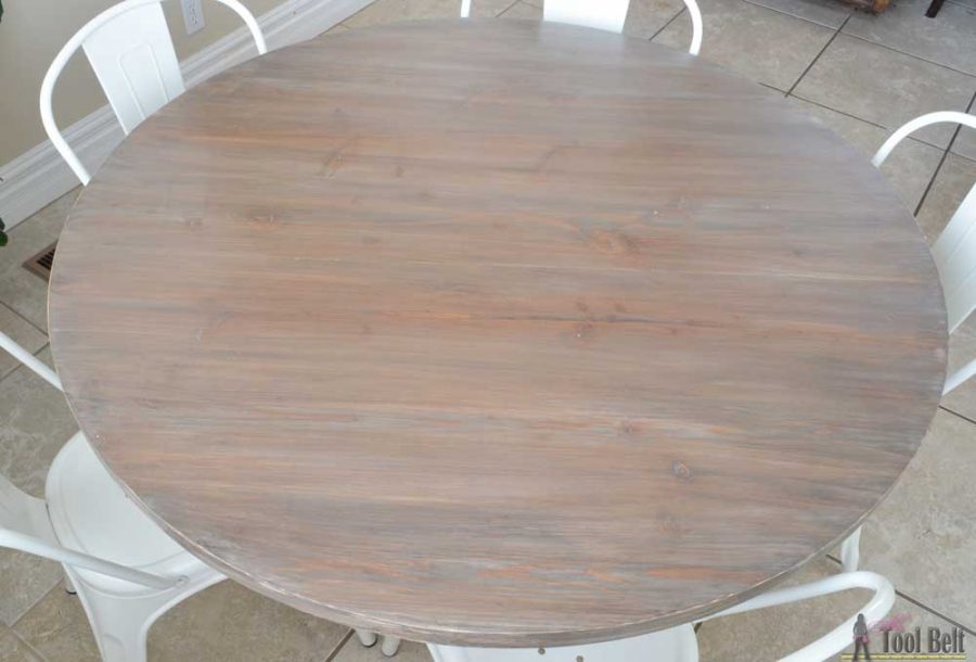 Free woodworking plans to build a chunky french farmhouse style 48" round pedestal table. This table is made from simple lumber (2x8, 2x6, 2x4) from Home Depot. Love the reclaimed wood finish!