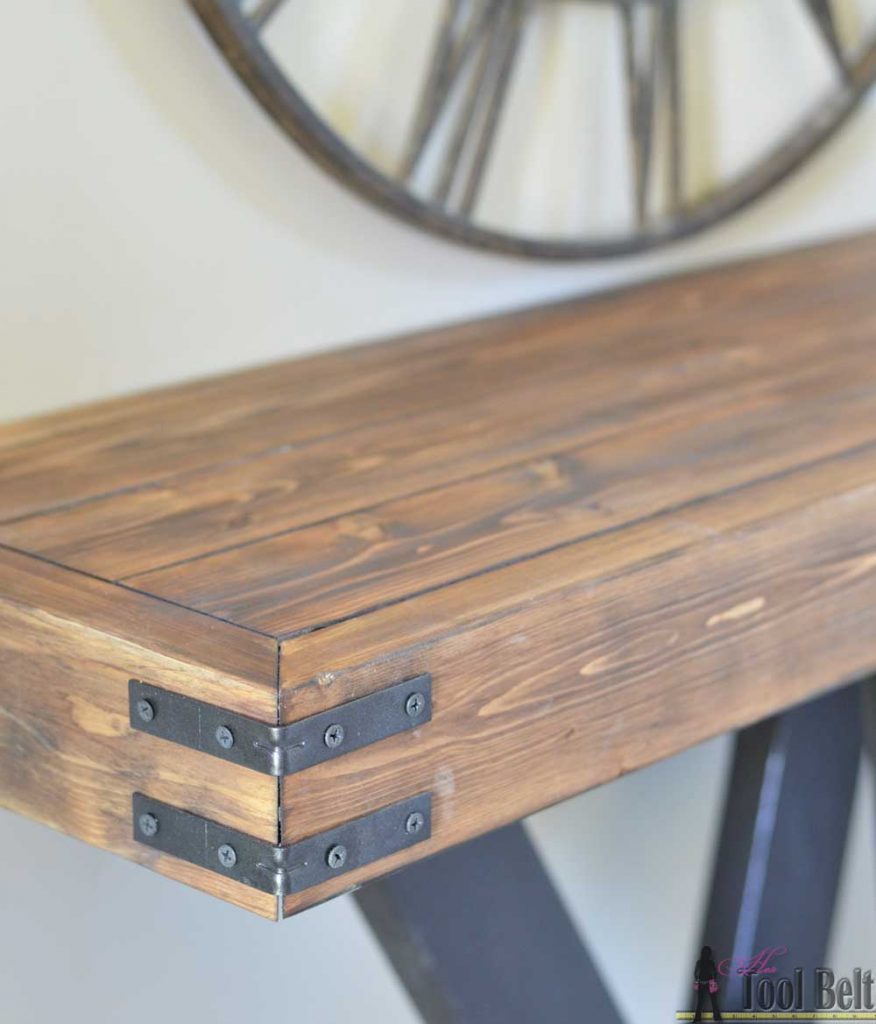 Build a rustic console table from simple 2x4 lumber. Free plans and building tutorial. 