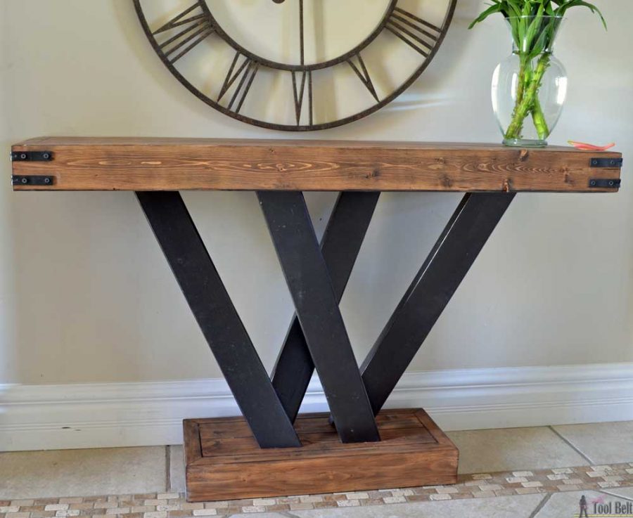 Build a rustic console table from simple 2x4 lumber. Free plans and building tutorial. 