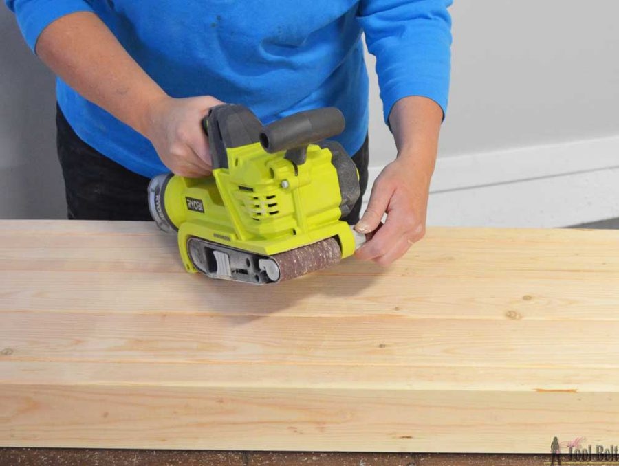 Build a rustic console table from simple 2x4 lumber. Free plans and building tutorial. 