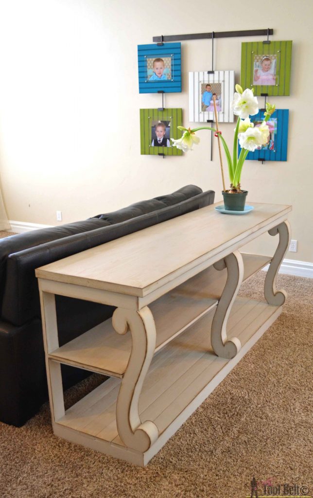 console table with scroll legs