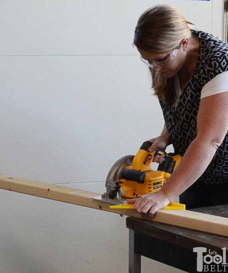 Take advantage of that empty space above your garage door. Build an overhead garage storage shelf perfect for seasonal storage items. 