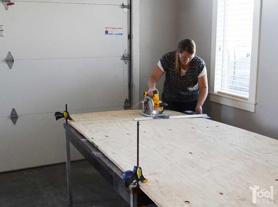 Take advantage of that empty space above your garage door. Build an overhead garage storage shelf perfect for seasonal storage items. 