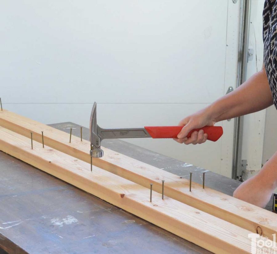 Take advantage of that empty space above your garage door. Build an overhead garage storage shelf perfect for seasonal storage items. 