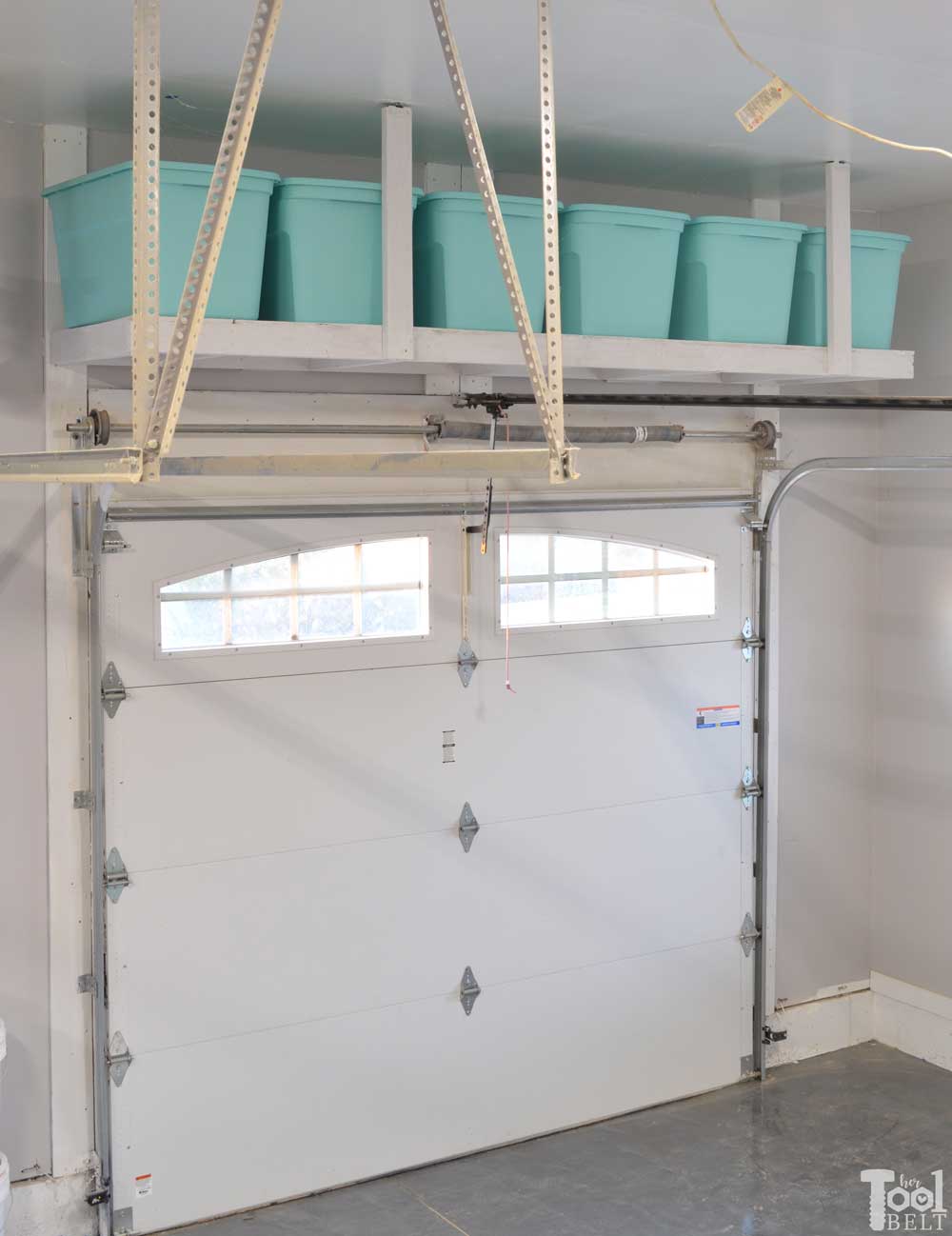 Suspended shelving might just be for you if you're planning to make use of every square foot of your garage. Garage Overhead Storage Diy : Overhead Garage Storage Shelf Her Tool Belt