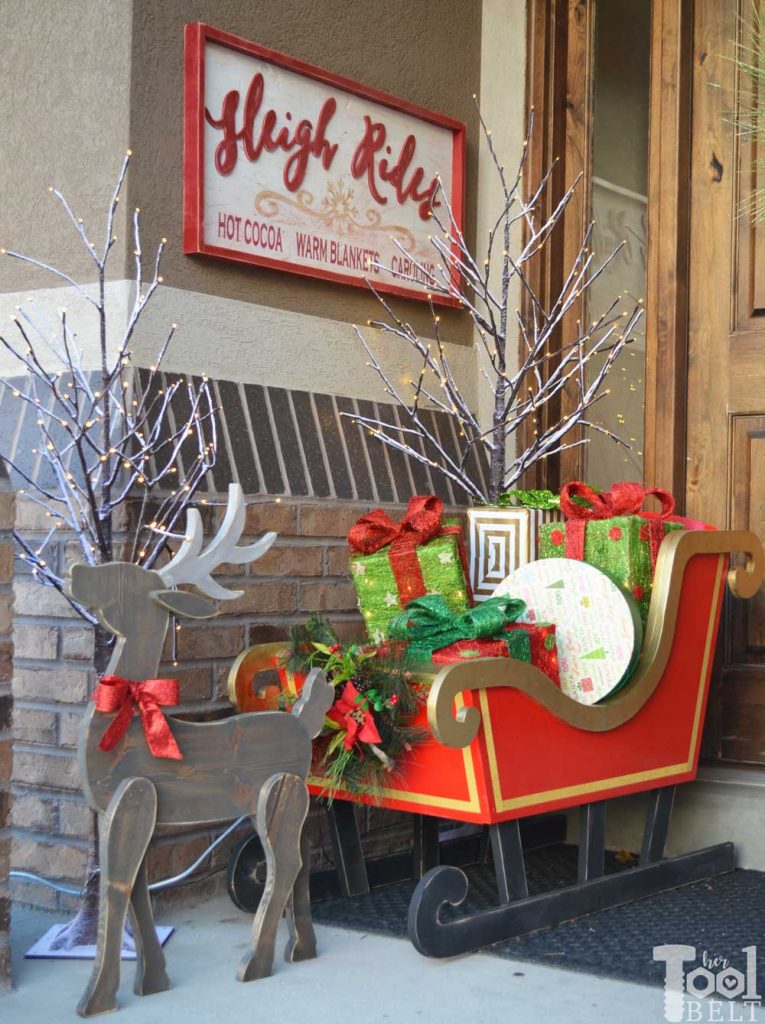 Make a festive Christmas or Winter Sleigh Rides wood sign, perfect for the porch. Free plans and pattern.