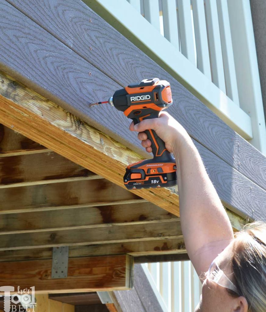 Fixing a sagging deck, removing the treks wrapping.