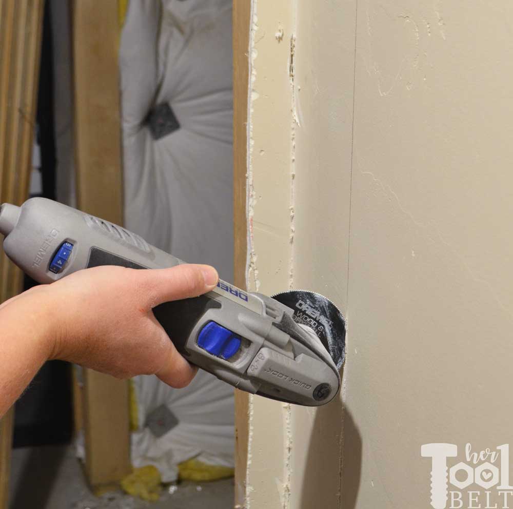 use-drywall-oscillating-tool-attachment-to-cut-drywall - Her Tool Belt - How To Cut Hung Drywall With An Oscillating Tool