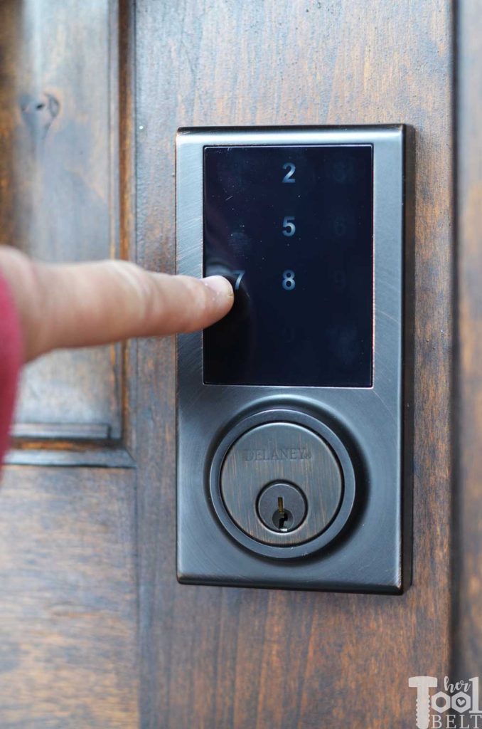 Getting ready for holiday visitors by refreshing the front door and installing a cool touch pad keyless entry lock. See 12 gorgeous door updates with the 12 doors of December @DelaneyHardware #DelaneyHardware #12DoorsofDecember