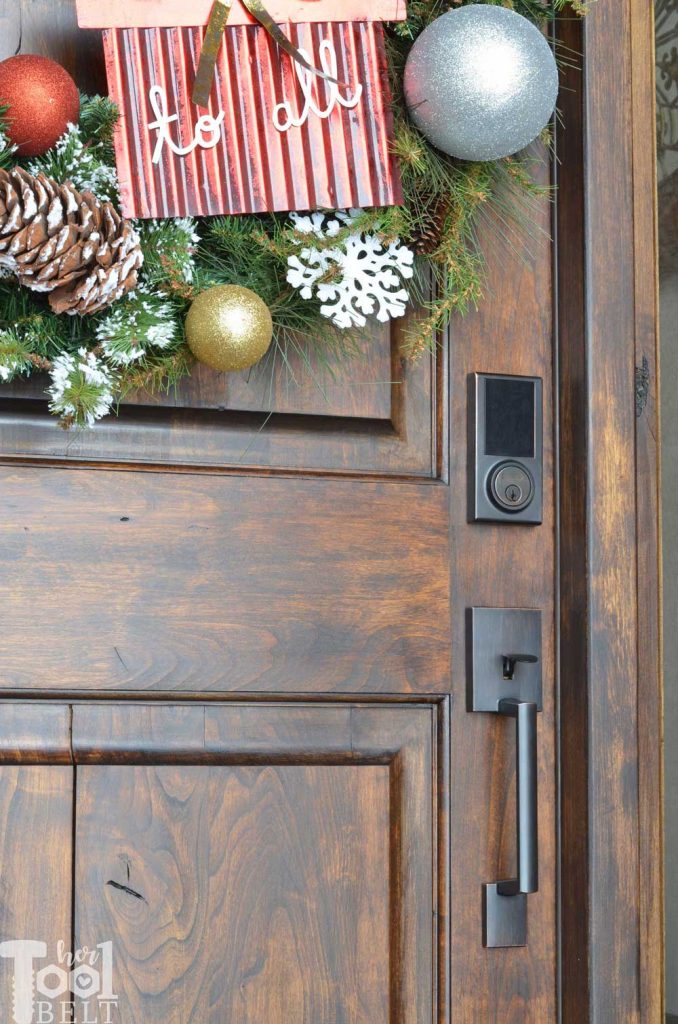 Getting ready for holiday visitors by refreshing the front door and installing a cool touch pad keyless entry lock. See 12 gorgeous door updates with the 12 doors of December @DelaneyHardware #DelaneyHardware #12DoorsofDecember