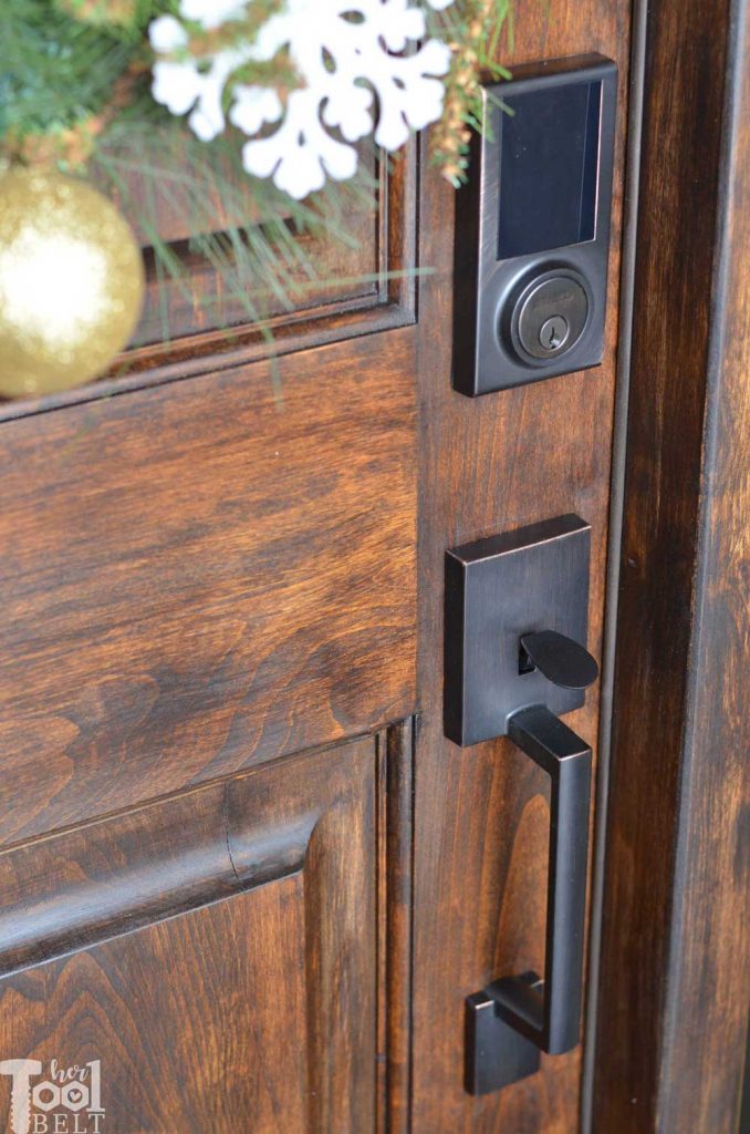 Getting ready for holiday visitors by refreshing the front door and installing a cool touch pad keyless entry lock. See 12 gorgeous door updates with the 12 doors of December @DelaneyHardware #DelaneyHardware #12DoorsofDecember