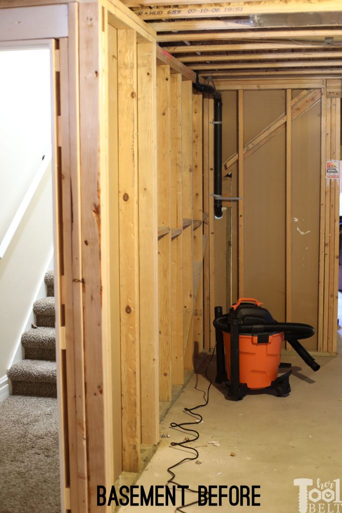 This Mom built a basement playhouse for her kids. It's really a toy room shaped like a tiny house...come take a tour.