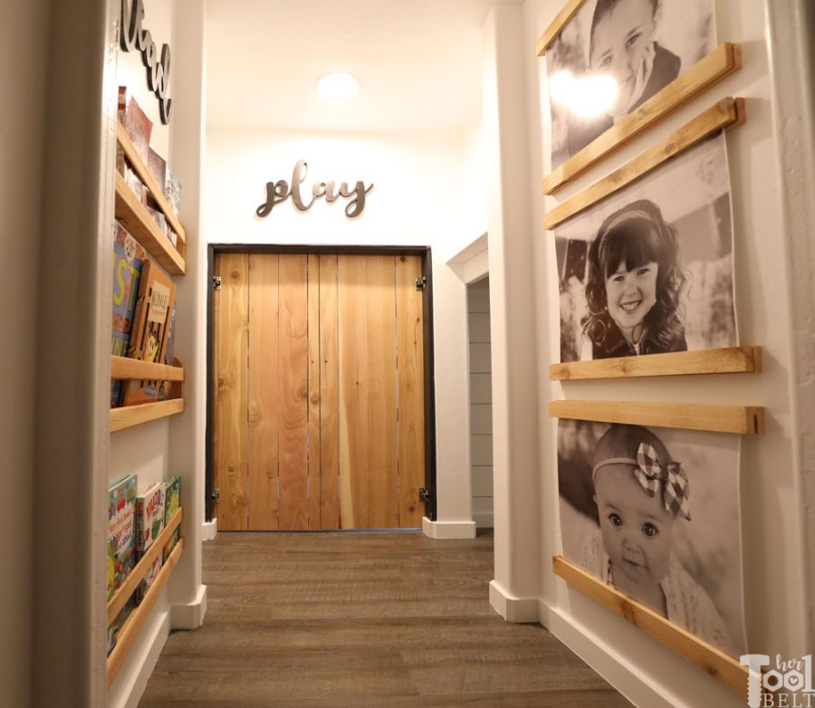 This Mom built a basement playhouse for her kids. It's really a toy room shaped like a modern farmhouse tiny house...come take a tour.