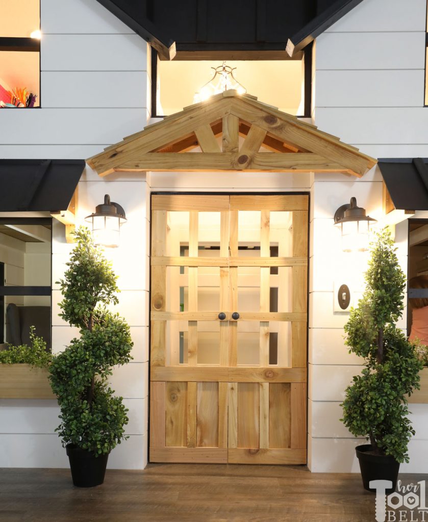 This Mom built a basement playhouse for her kids. It's really a toy room shaped like a modern farmhouse tiny house...come take a tour.