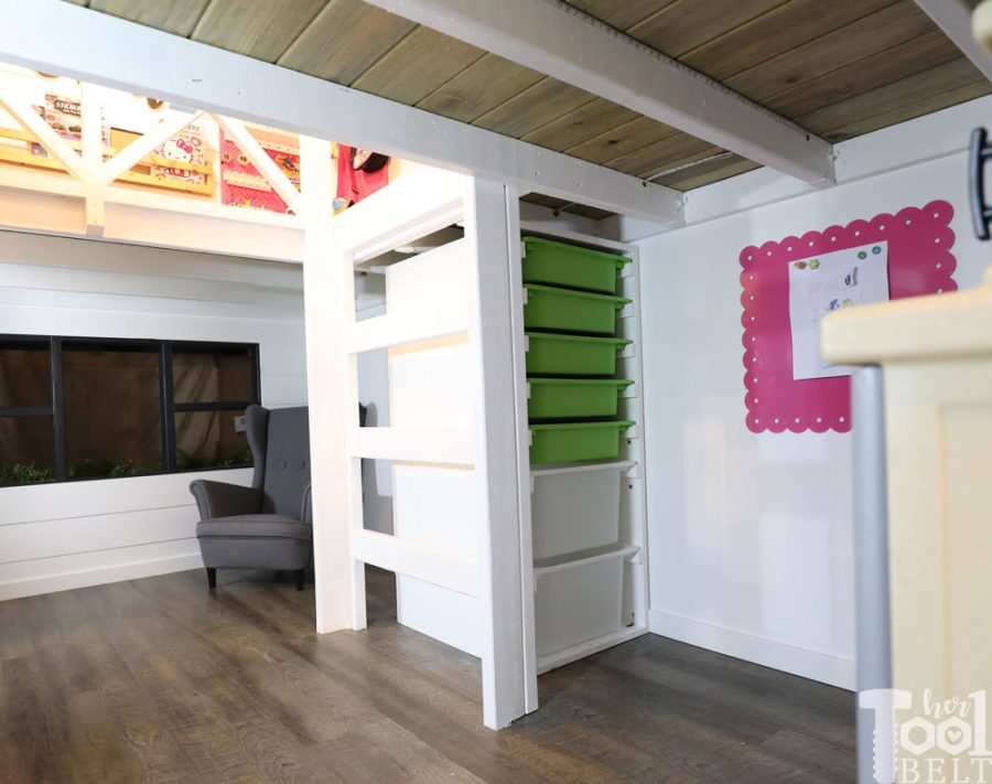 This Mom built a basement playhouse for her kids. It's really a toy room shaped like a modern farmhouse tiny house...come take a tour.