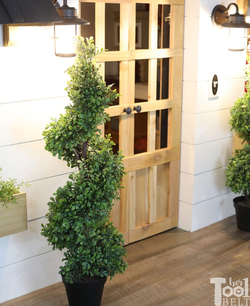 This Mom built a basement playhouse for her kids. It's really a toy room shaped like a modern farmhouse tiny house...come take a tour.