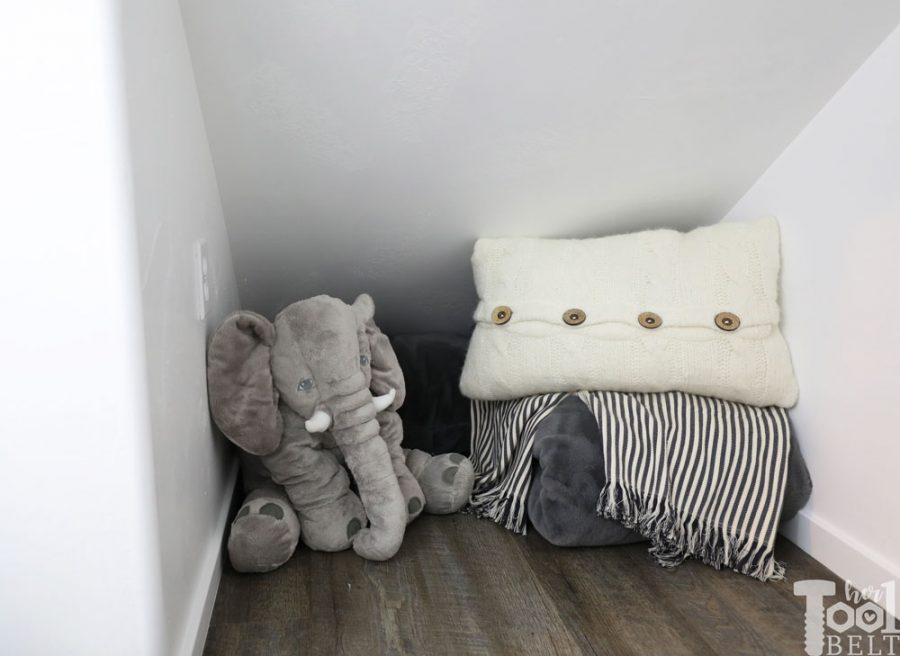 This Mom built a basement playhouse for her kids. It's really a toy room shaped like a modern farmhouse tiny house...come take a tour.