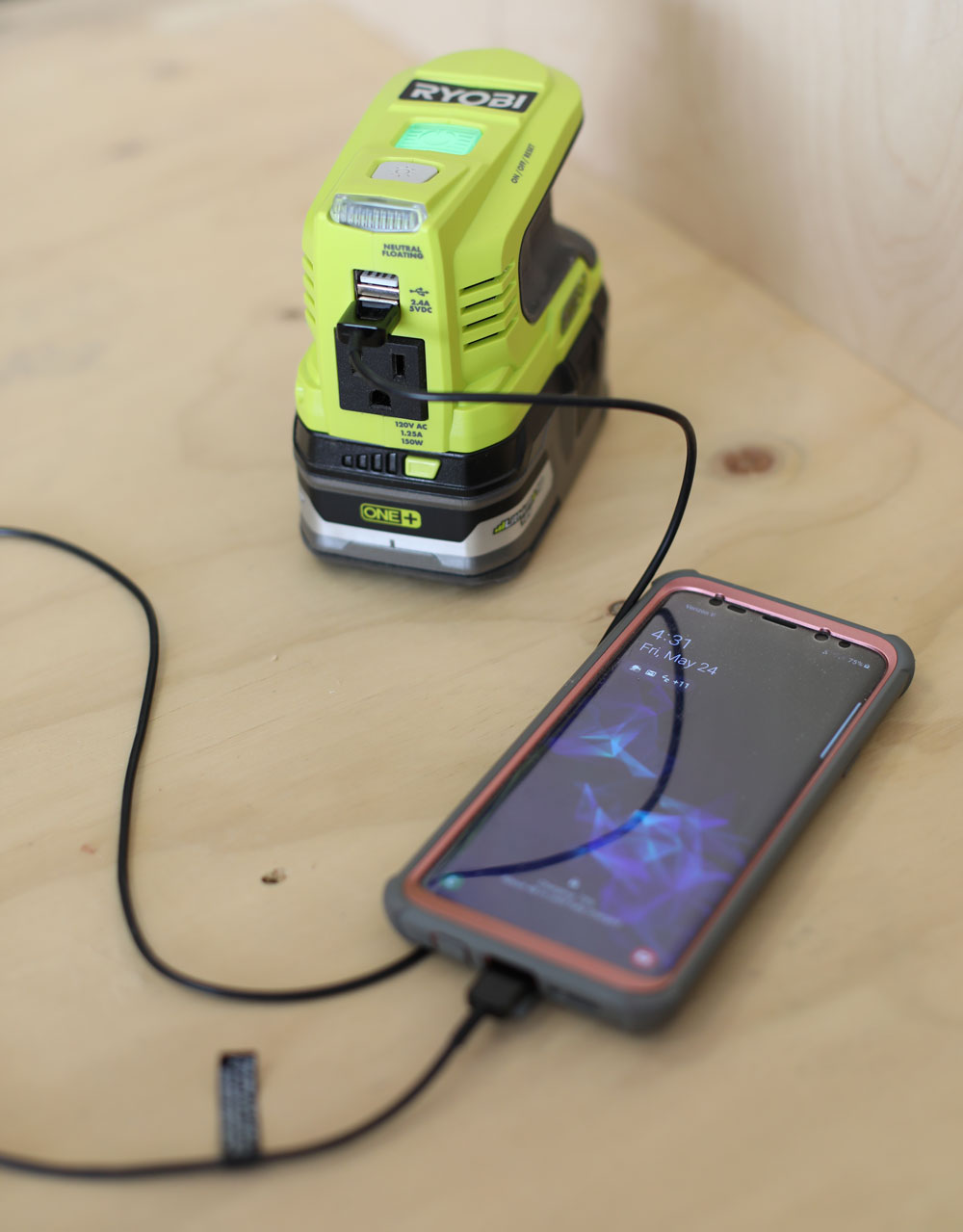 https://www.hertoolbelt.com/wp-content/uploads/2019/05/ryobi-inverter-tool-review-charging-phone.jpg