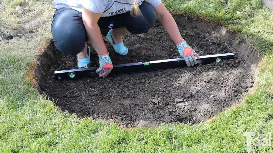 level dirt - How to build a DIY backyard firepit with wall blocks from Home Depot. 