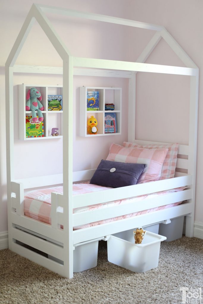 Free plans to build a house frame toddler bed with under the bed storage bins.