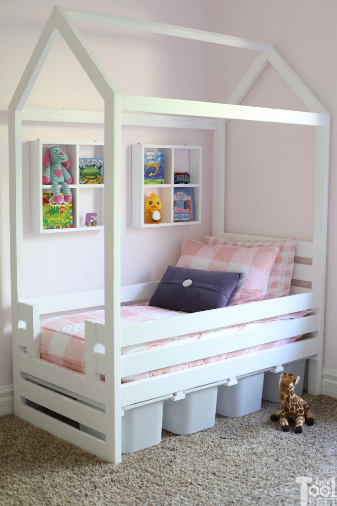 Free plans to build a house frame toddler bed with under the bed storage bins.