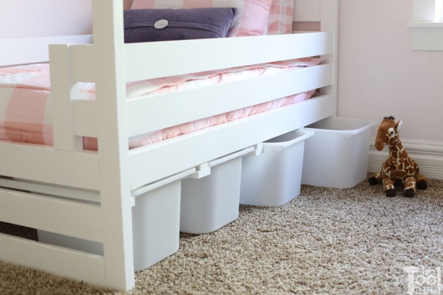 Free plans to build a house frame toddler bed with under the bed storage bins.