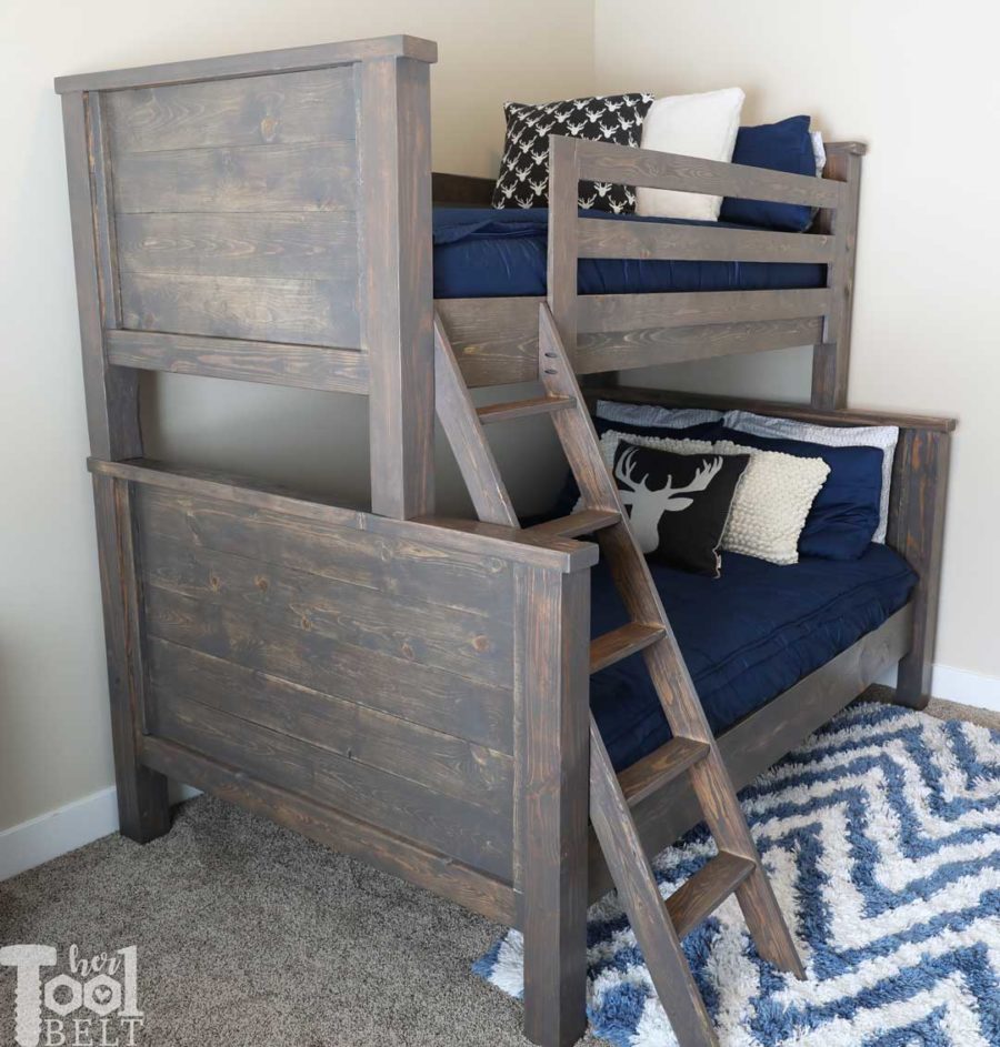 Save space in your kid's bedroom. Free plans to build a farmhouse style twin over full bunk bed. Deer pillows