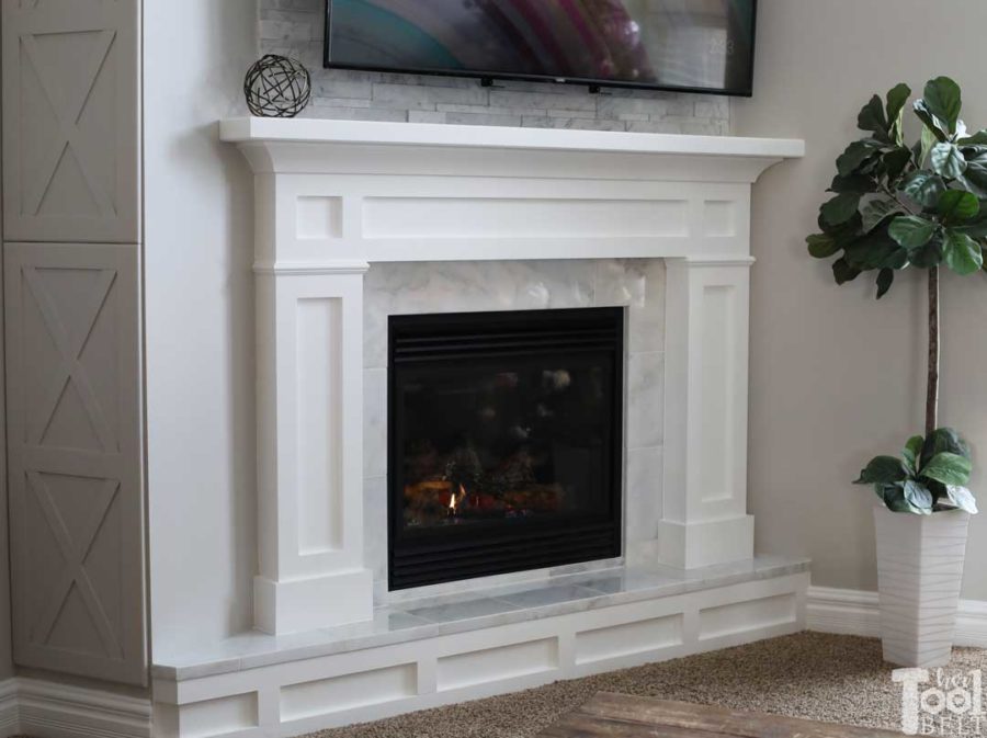 Updating an old builder grade fireplace, into a Modern Farmhouse Mantel. This white fireplace is set in the corner of the room, but the plans will work for corner or straight walls.