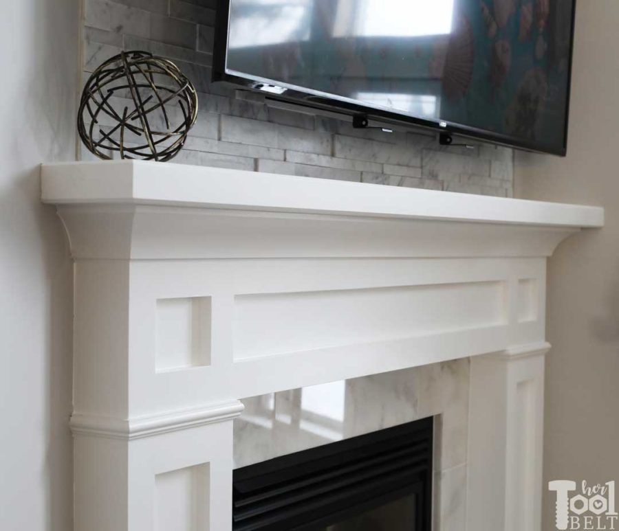 Updating an old builder grade fireplace, into a Modern Farmhouse Mantel. This white fireplace is set in the corner of the room, but the plans will work for corner or straight walls.