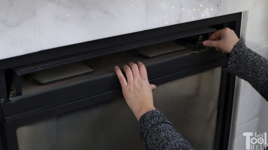 How to open and clean gas fireplace glass. Get rid of the gunk on the inside of the fireplace glass. 