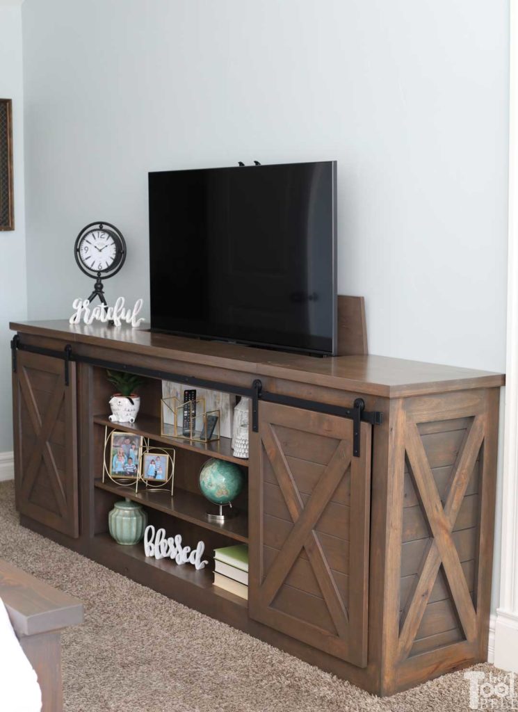 Build a sliding barn door console table with a secret...a hidden TV lift.